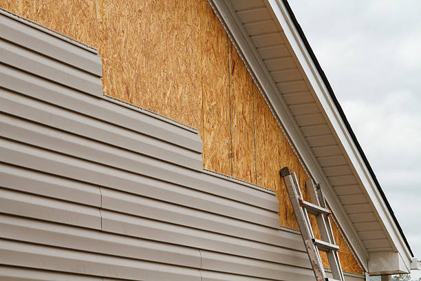 Professional Siding Replacement technician working in Peach Bottom, PA